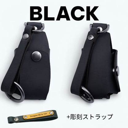 アウディ車用スマートキーケース（黒・彫刻ストラップ付き）の前面と背面。刻印入りでギフトにも適した上質かつ実用的なデザイン。